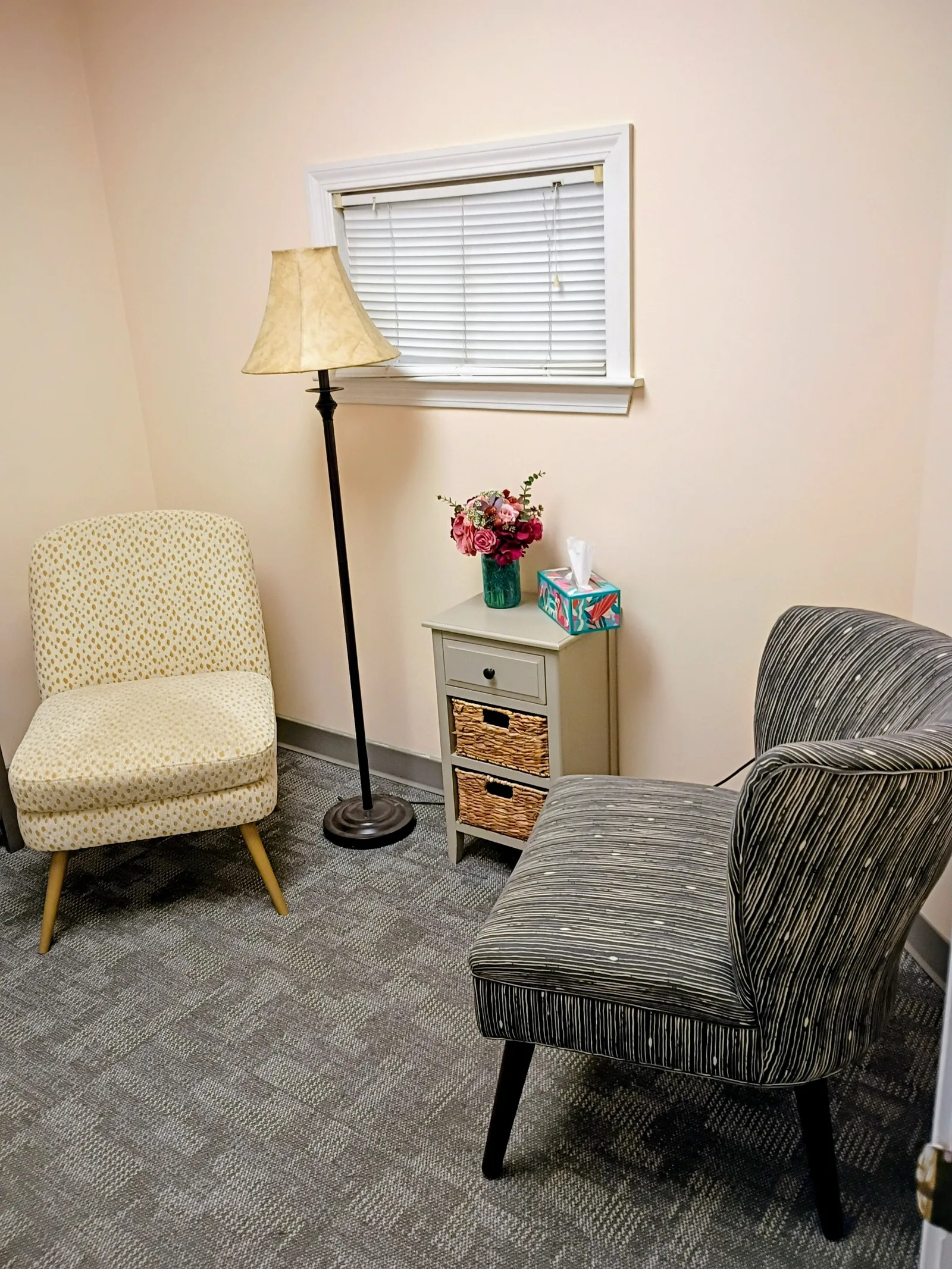 A patient advocate reviewing pregnancy information with a woman in a private setting